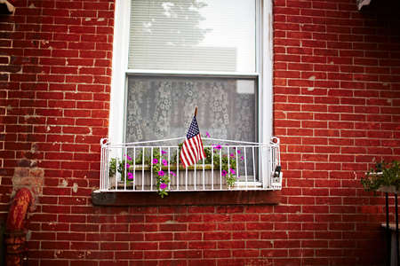 Window and red brick wallの写真素材