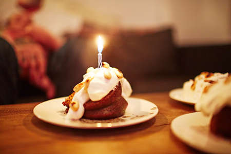 Dessert with birthday candleの写真素材