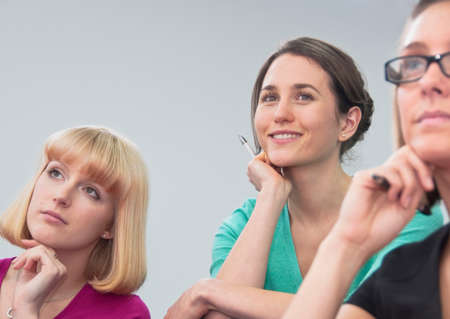 Women listening to presentationの写真素材