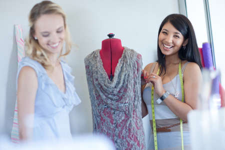 Dressmakers working in studioの写真素材