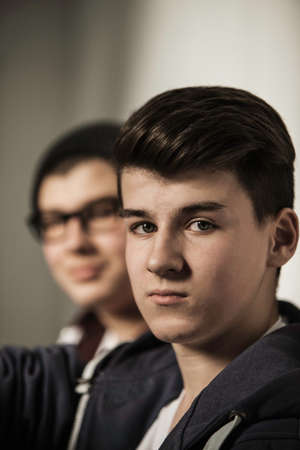 Two teenage boys, focus on foregroundの写真素材