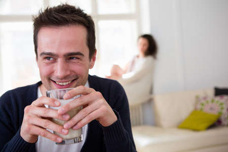 Mature man drinking a smoothieの写真素材