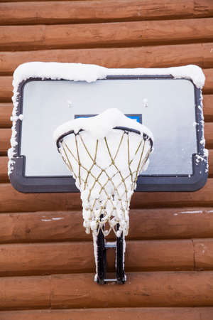 Snow filled basketball netの写真素材