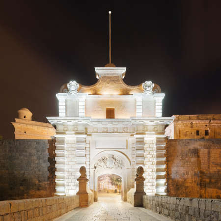 Mdina gate illuminated at night, Maltaの写真素材