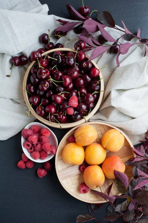 Still life of fresh fruits in bowlsの写真素材