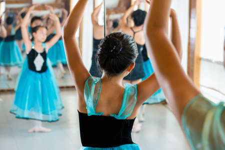Ballet dancers practising in studio