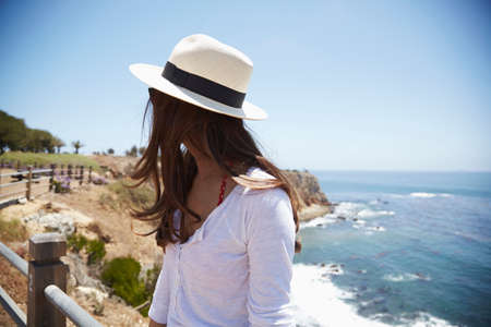 Young woman wearing sunhat, Palos Verdes, California, USAの写真素材