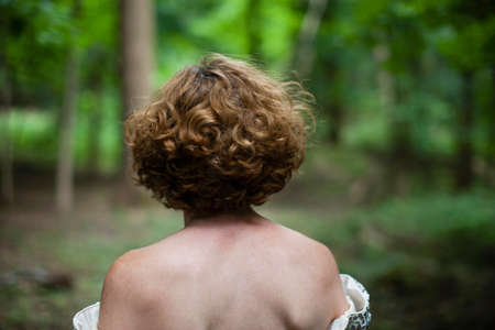 Close up of woman in forestの写真素材