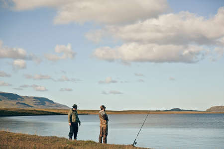 Men on fishing tripの写真素材