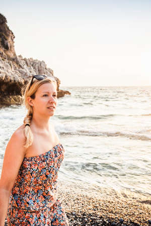 Young woman at Seitani Bay, Samos, Greece