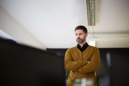 Casual businessman in officeの写真素材