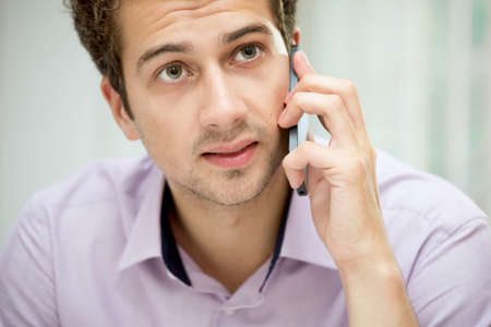 Young man on mobile phone