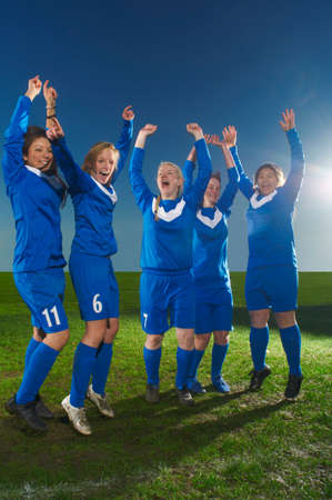 Female football team cheeringの写真素材