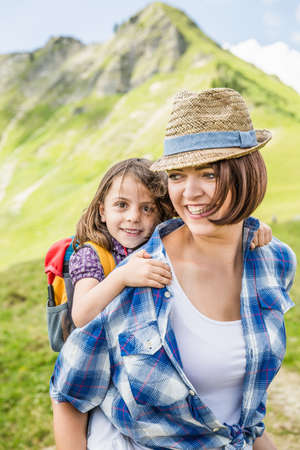 Portrait of mother and daughter smiling, Tyrol, Austriaの写真素材