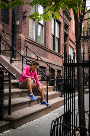 Woman sitting on steps