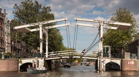 Bridge over canal, Amsterdam, Netherlandsの写真素材