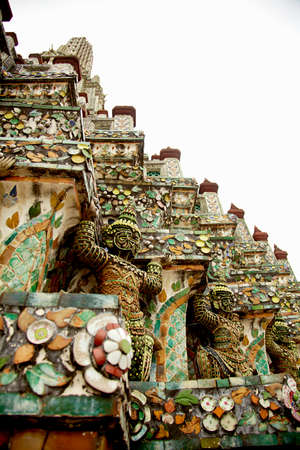Ornate temple roof with statues, Bangkok, Thailand