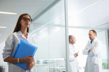 Doctors at work in officeの写真素材