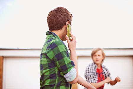 Boy on cell phone