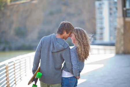 Romantic young couple on waterfront