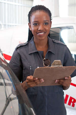 Student pilot holding clipboard