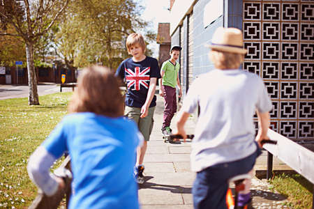 Group of boys on pavementの写真素材