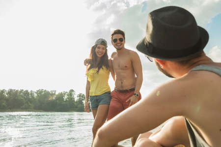 Young couple by lake