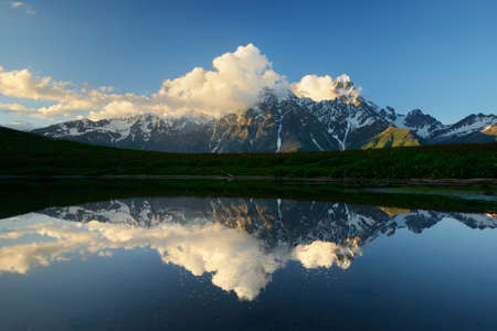 Lake mirror image of Ushba mountain, Mazeri village, Svaneti, Georgia