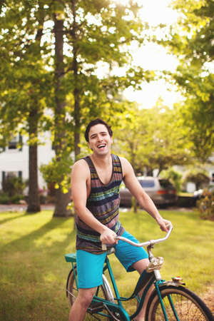 Young man on bikeの写真素材