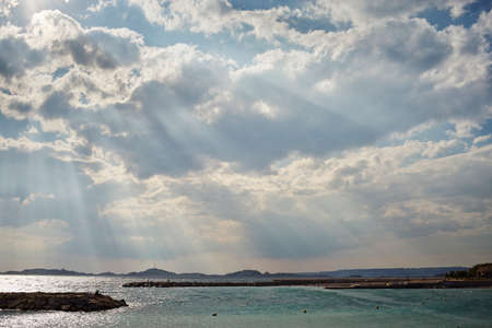 Sea, storm clouds and sunbeams, Marseille, Franceの写真素材