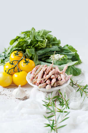 Pinto beans and yellow tomatoes, still life