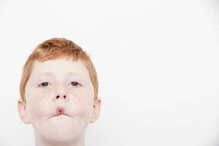Boy making funny facesの写真素材