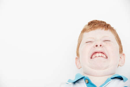 Boy making funny facesの写真素材