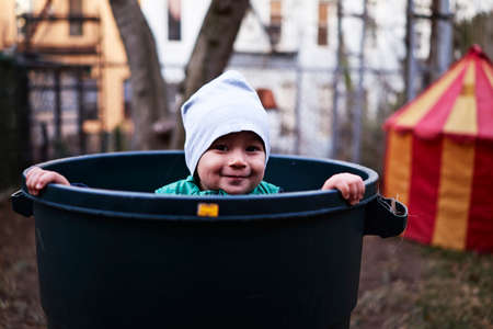 Boy inside tub, Brooklyn, New York, USAの写真素材