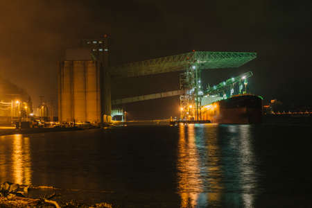 Oil tanker on Puget Sound at night, Tacoma, Washington State, USAの写真素材