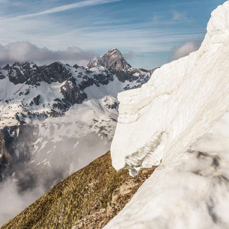 Snow on steep mountainside, Bavarian Alps, Oberstdorf, Bavaria, Germanyの写真素材