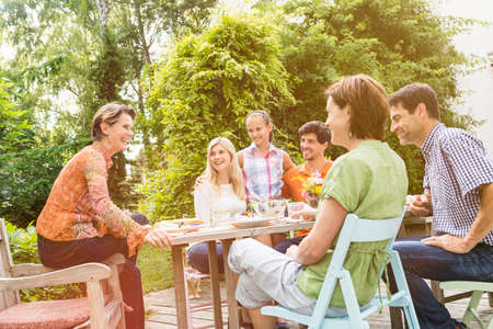 Family enjoying barbecueの写真素材