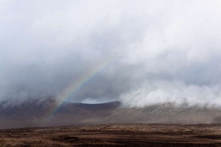 Rainbow in cloud, Glencoe, Scottish Highlands, Scotlandの写真素材
