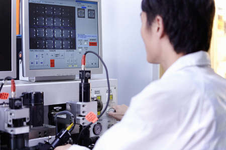 Technician working in LED factory