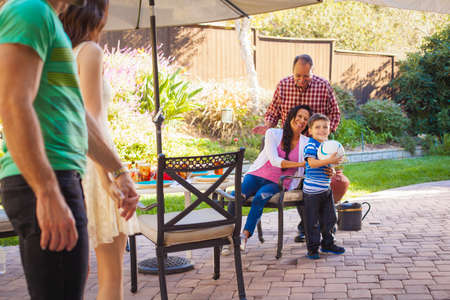 Three generation family in garden