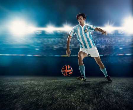 Footballer chasing ball