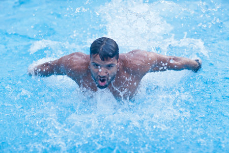 Man swimming in poolの写真素材
