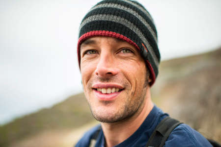 Portrait of male hiker in knit hat, Big Sur, California, USA
