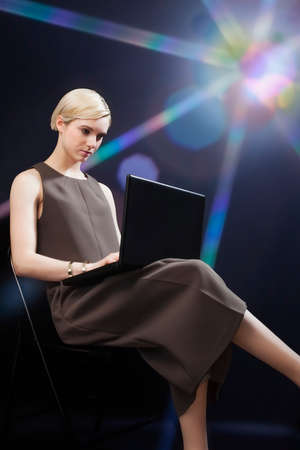 Young woman using laptop