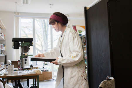 Artist working in studio