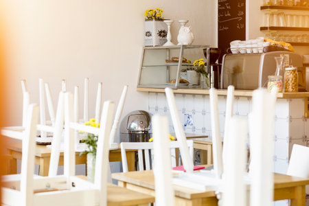 Cafe interior, closed, chairs on tables
