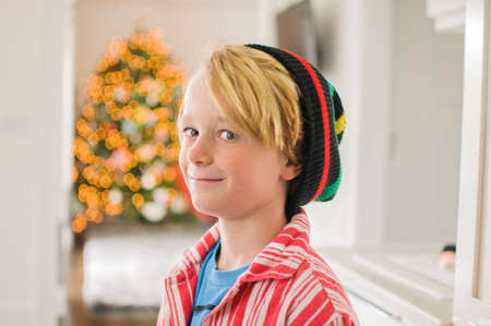 Portrait of boy wearing knit hat looking sidewaysの写真素材