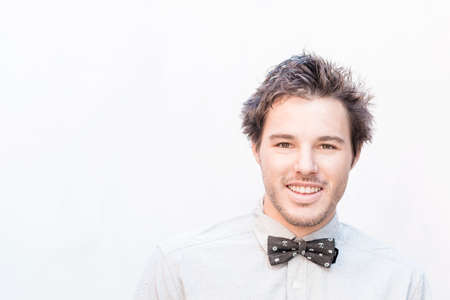 Portrait of young man wearing bow tie