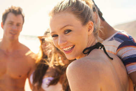 Group of friends on vacation at beachの写真素材