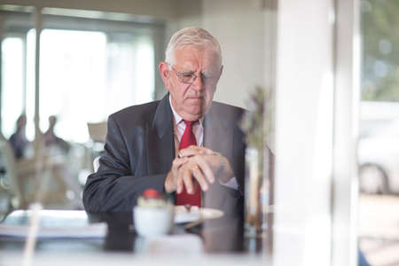 Business man waiting for business lunch appointment